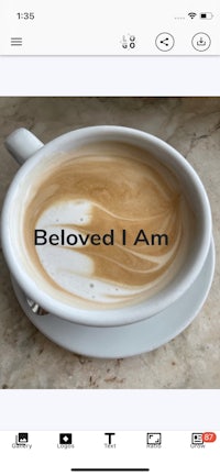 a cup of coffee with the words'beloved i am'on it
