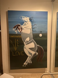 a painting of a horse on a wall